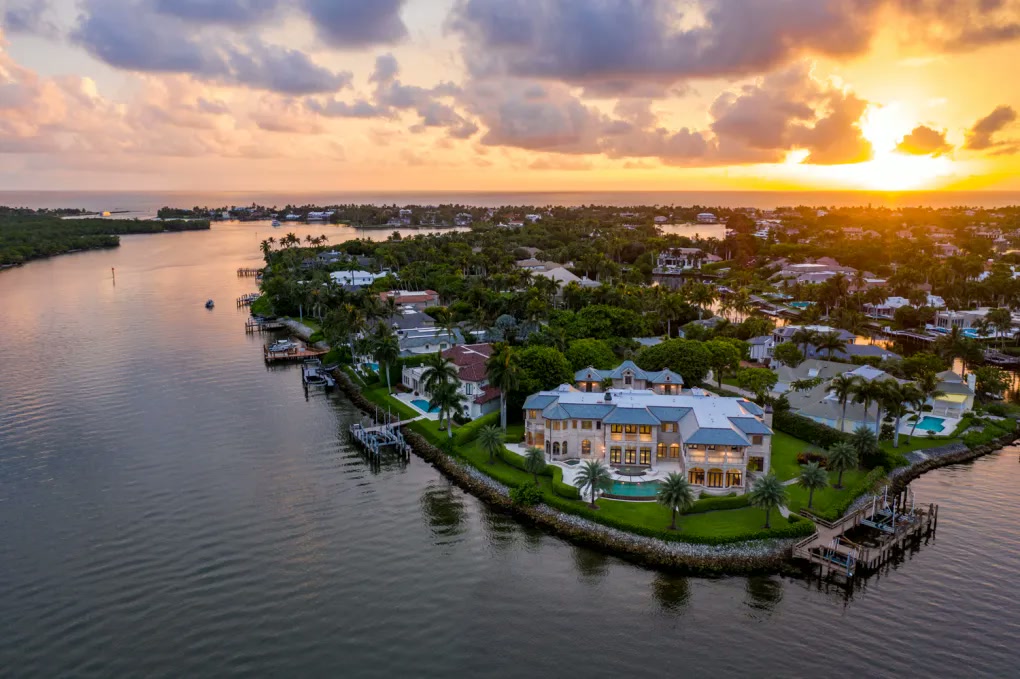 Aerial view placing the estate along the Naples waterfront