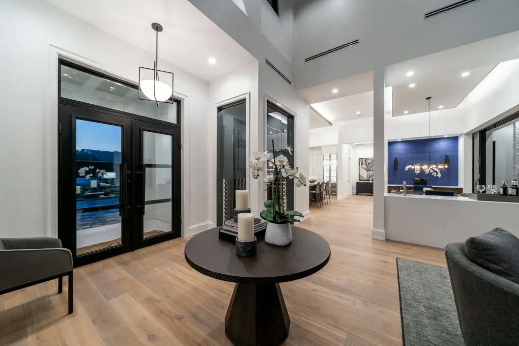 Open entry view connecting the living room and pool