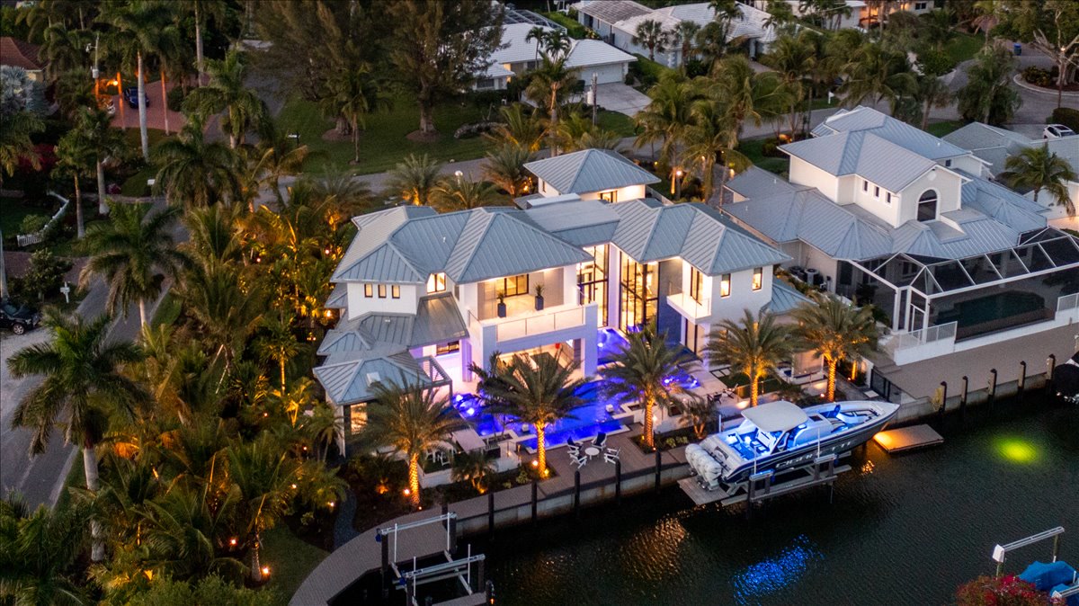 Aerial view of the illuminated rear elevation along the canal