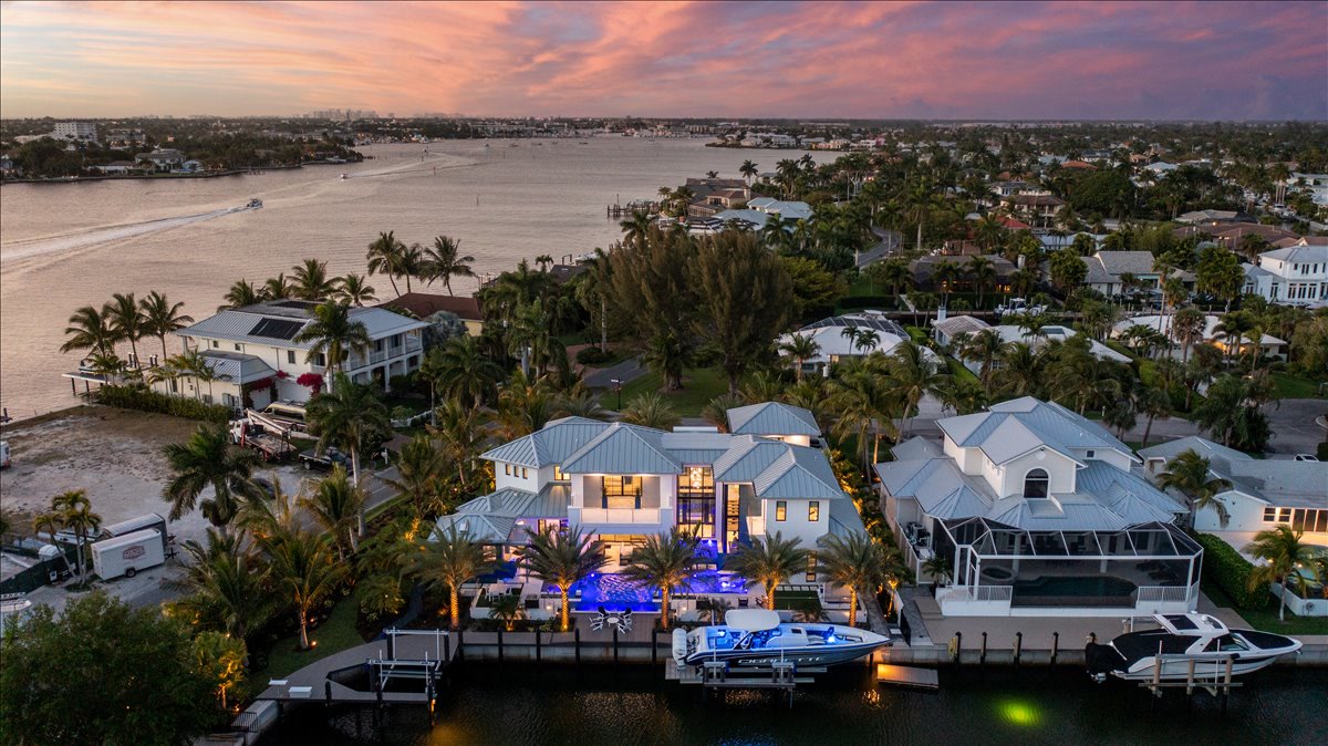 Aerial view placing the estate within its waterfront neighborhood